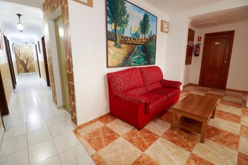 Posezení v ubytování Hotel Virgen de los Reyes