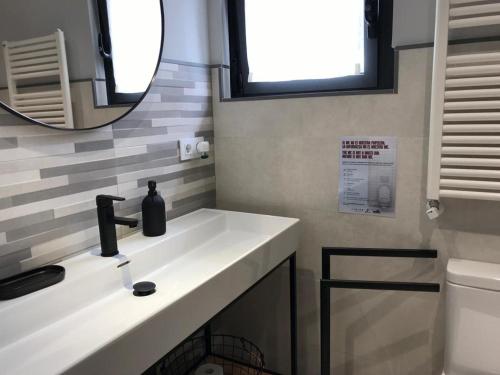 Ένα μπάνιο στο Apartamentos Jayo