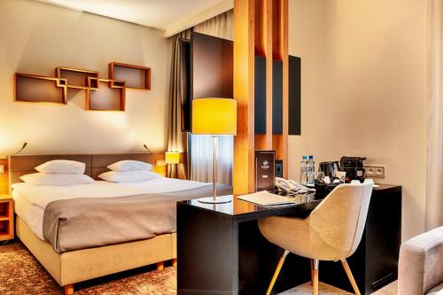 Lova arba lovos apgyvendinimo įstaigoje Focus Hotel Premium Sopot