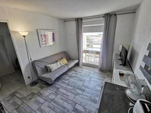 Posteľ alebo postele v izbe v ubytovaní Le Carlton -Beau F2 front de mer Balcon