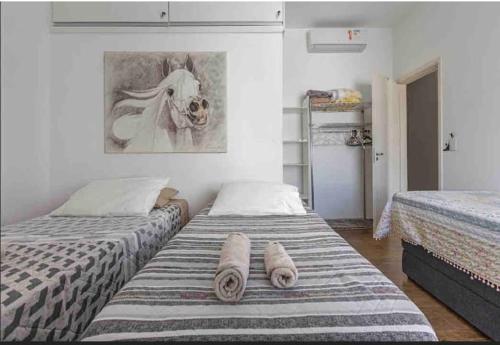 Кровать или кровати в номере Itaim bibi Apartment