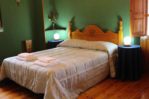 Ένα ή περισσότερα κρεβάτια σε δωμάτιο στο Casa vacacional Valles Pasiegos