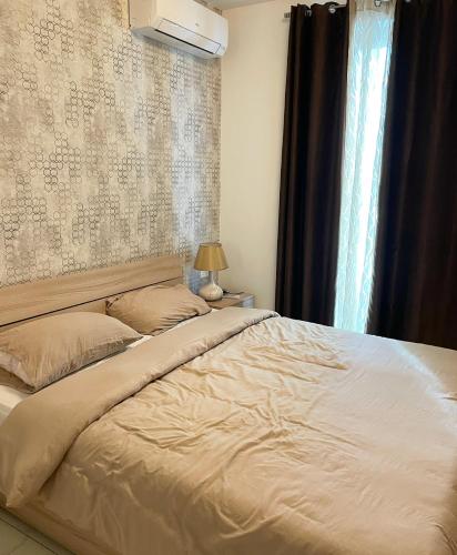Postel nebo postele na pokoji v ubytování Stylish 1 bedroom apartment in central Msida C11A