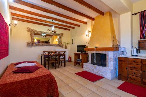 Postel nebo postele na pokoji v ubytování Corfu Sokraki Villas