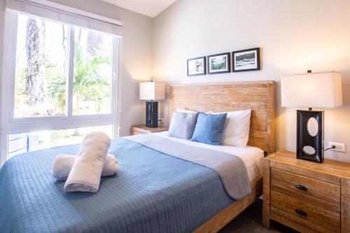 a bedroom with a large bed and a window at Villa #34 - Blue Venao, Playa Venao in Playa Venao