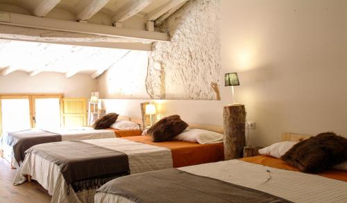 Posteľ alebo postele v izbe v ubytovaní Clauhomes Casa Rural Deluxe