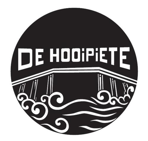a black and white sign with the words de hobrite at 't Hooiland in Lo-Reninge