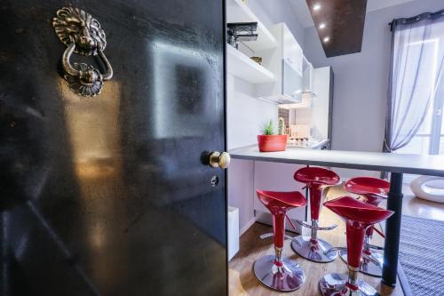 Η κουζίνα ή μικρή κουζίνα στο Apart Hotel Torino