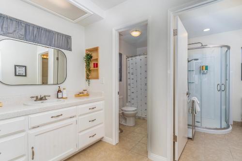 a bathroom with a sink and a shower at Close to JT Park & Town w/360 View The Green Adobe in Joshua Tree