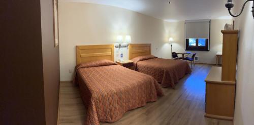 Hotel Oliver Inn Tolucaにあるベッド