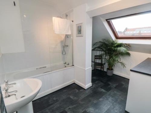 Et badeværelse på Saints Cottage