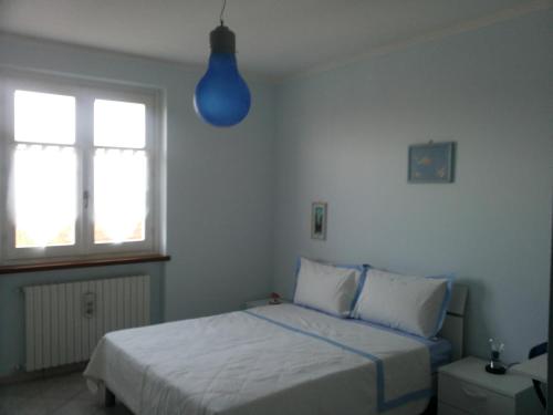 Ένα ή περισσότερα κρεβάτια σε δωμάτιο στο Conte Caramelli Apartment