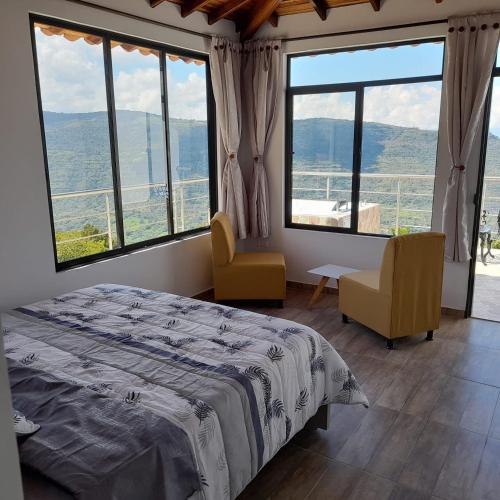 Cama o camas de una habitación en GLAMPING SAN GIl TRINIDAD CIELO