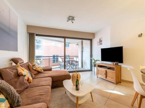 Televisyen dan/atau pusat hiburan di Luxury Stay in Blankenberge