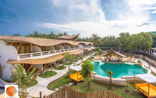 een afbeelding van een resort met een zwembad bij Pearl Sunset Resort in Gili Trawangan