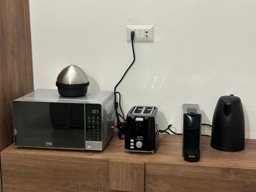 Kaffe- og tefaciliteter på Archome Luxury Apartment