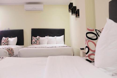 Postel nebo postele na pokoji v ubytování Hotel Alto Mar