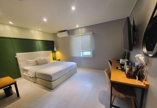 Cama o camas de una habitación en Vole Hotel