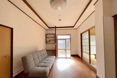 Ruang duduk di Guest House Koyama -南紀白浜 ゲストハウス 小山- ペット可