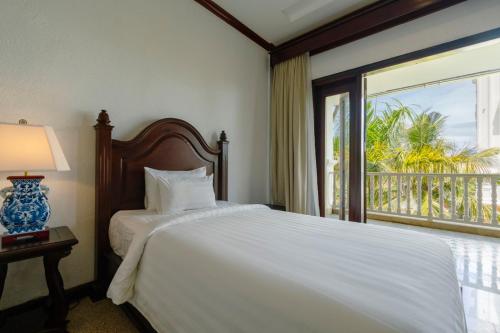 Voodi või voodid majutusasutuse Tahiti Resort toas