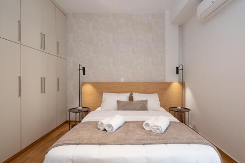 Posteľ alebo postele v izbe v ubytovaní Deluxe 4 Bedrooms Apartment in Athens Center