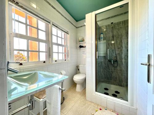 a bathroom with a sink and a shower at apartment in Villa de Mazo