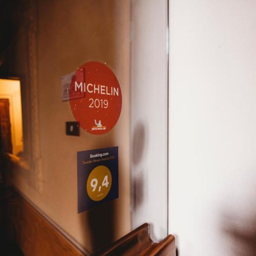 a sign on a wall that says michigan at Salotto delle Arti in Modena