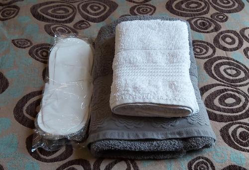 a towel and a bottle of soap on a table at Fener sweet in Istanbul