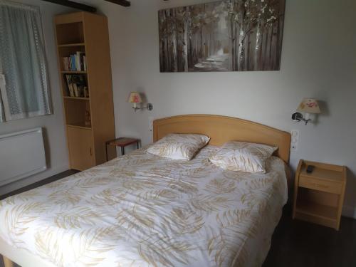 Katil atau katil-katil dalam bilik di Gîte Cosy Grand confort dans un écrin de verdure