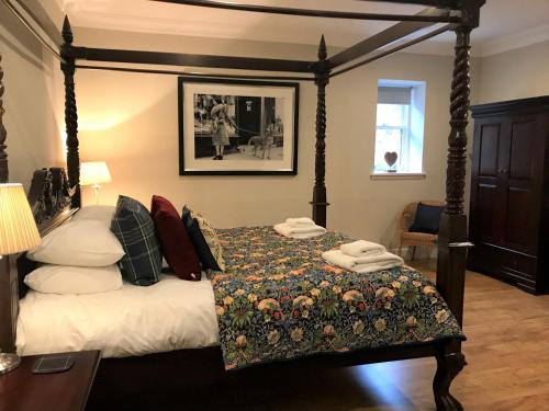Posteľ alebo postele v izbe v ubytovaní Cherry Blossom Cottage