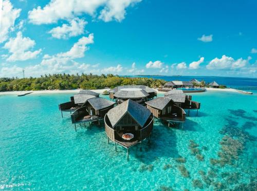 an aerial view of a resort in the water at Lily Beach Resort and Spa - All Inclusive in Dhangethi