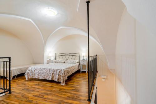 Katil atau katil-katil dalam bilik di Splendida Casa SupersanoSalento