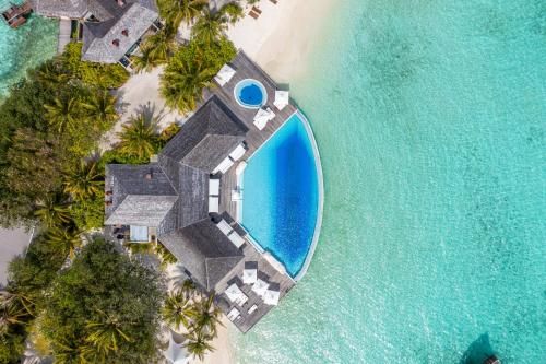 an aerial view of a resort on the beach at Lily Beach Resort and Spa - All Inclusive in Dhangethi