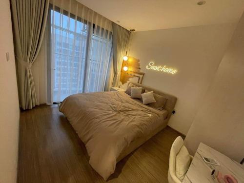 Postel nebo postele na pokoji v ubytování NK#Homestay#Vinhomes#Oceanpark#1PN#C41