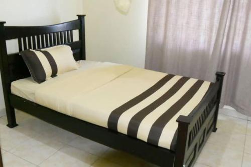 Ein Bett oder Betten in einem Zimmer der Unterkunft Larry's Place - Gulu , Uganda