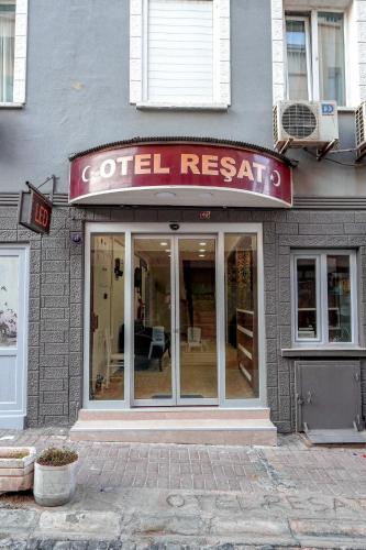ein Geschäft mit einem Schild, auf dem „Zellforschung“ steht in der Unterkunft Hotel Resat in Izmir