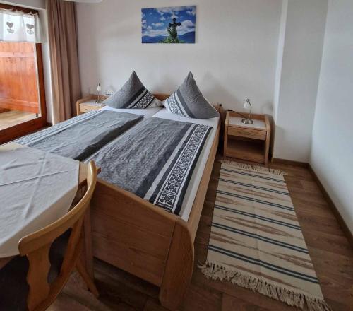 Cama o camas de una habitación en Gästehaus Kuchler