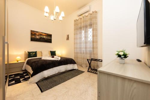 Ένα ή περισσότερα κρεβάτια σε δωμάτιο στο Diana Home