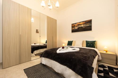 Ένα ή περισσότερα κρεβάτια σε δωμάτιο στο Diana Home