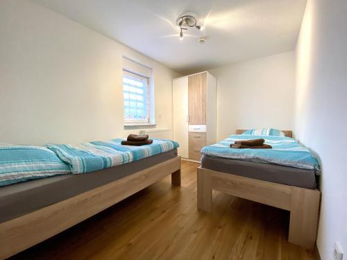 Ліжко або ліжка в номері Ferienhaus Julian