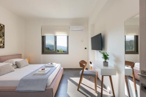 A bed or beds in a room at Villa Elia