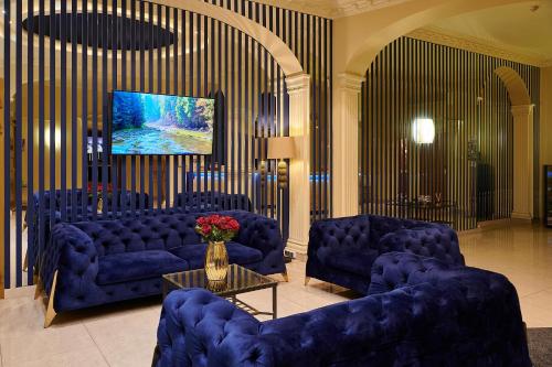 Zona de estar de Hotel Royal