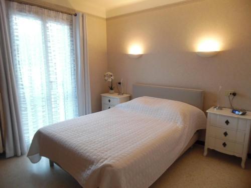 מיטה או מיטות בחדר ב-Appartement Amélie-les-Bains-Palalda, 2 pièces, 2 personnes - FR-1-703-116