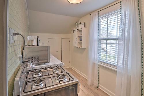 a kitchen with a stove and a window at Spacious Lexington Studio 2 Miles to Rupp Arena in Lexington