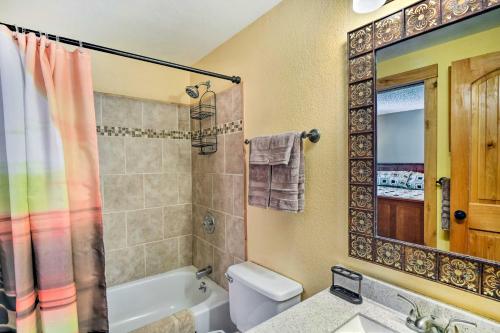 a bathroom with a tub and a toilet and a sink at Free Ski Shuttle Mtn Escape in Breckenridge! in Breckenridge