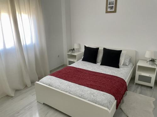 Postel nebo postele na pokoji v ubytování Apartamento Liru Bormujos, a 5 minutos de Sevilla