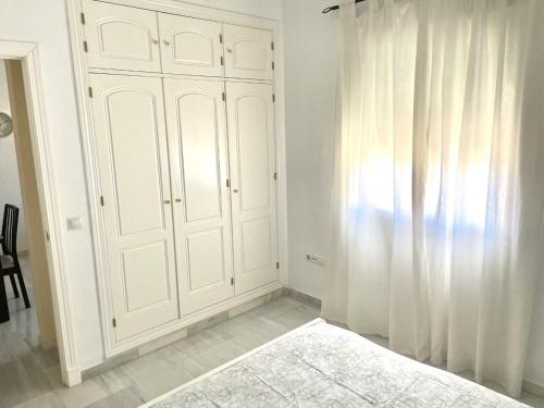 Postel nebo postele na pokoji v ubytování Apartamento Liru Bormujos, a 5 minutos de Sevilla