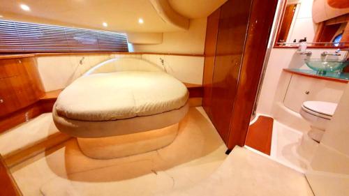 a bathroom with a toilet in a boat at Instagrammable Yacht Hotel Malta in Il- Gżira