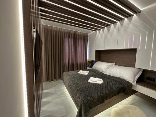 Llit o llits en una habitació de Mielno Escape Apartment