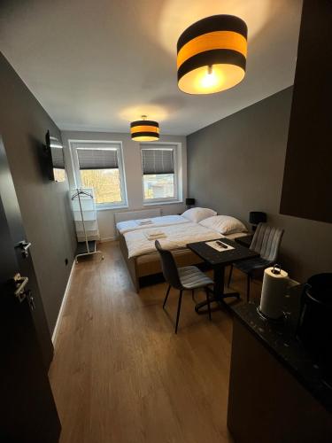 Ένα ή περισσότερα κρεβάτια σε δωμάτιο στο Apartmány Ambiente